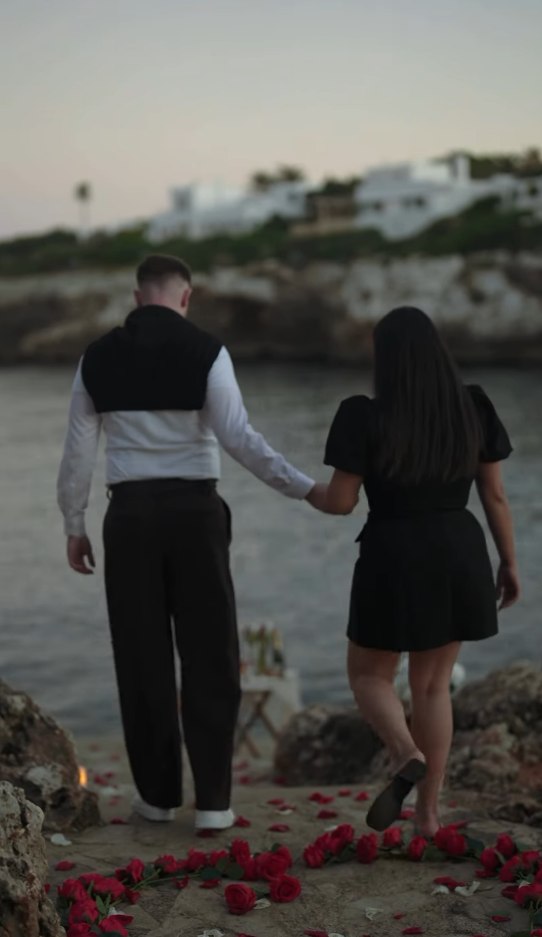 Walking back to the table, hand in hand